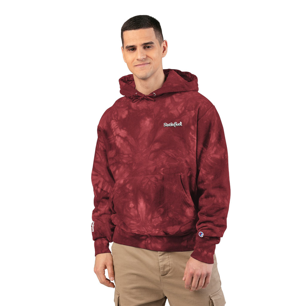 Man wearing a maroon tie-dye hoodie with a logo on a white background