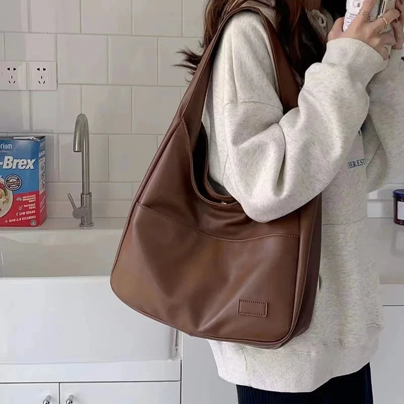 Large capacity tote bag, new black leather simple casual commuting women's bag, fashionable and versatile single shoulder bag Econic Blanks