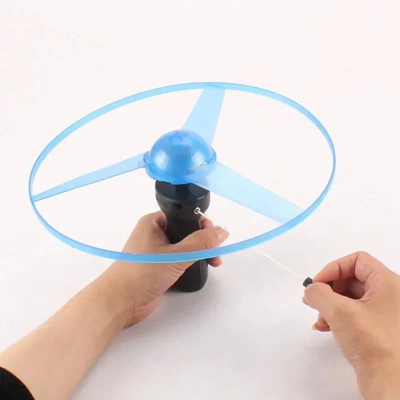 Pull Wire Glow UFO – Spinning LED Flyer Toy for Kids Outdoor Fun Econic Blanks