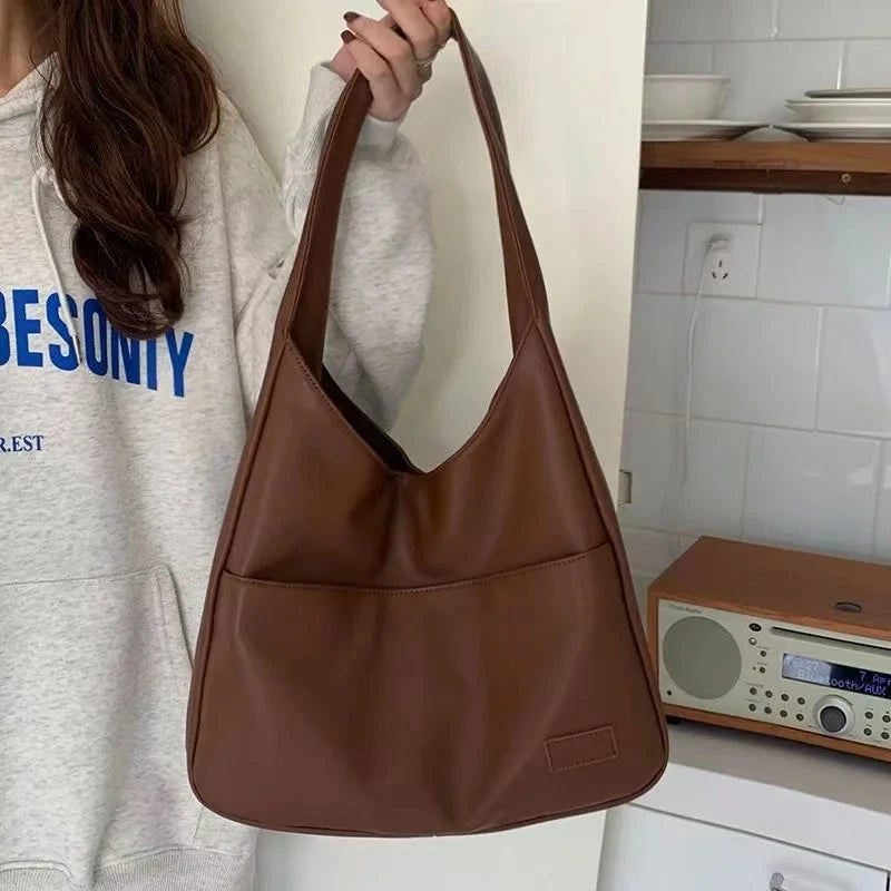 Large capacity tote bag, new black leather simple casual commuting women's bag, fashionable and versatile single shoulder bag Econic Blanks