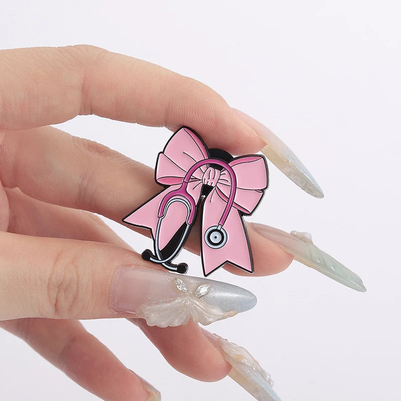 Pink Bowknot Medical Tools Stethoscope Enamel Pins Surgical Gloves Capsule Band Aid Brooches Clothes Lapel Badges Jewelry Gift Quick Pick Grocers