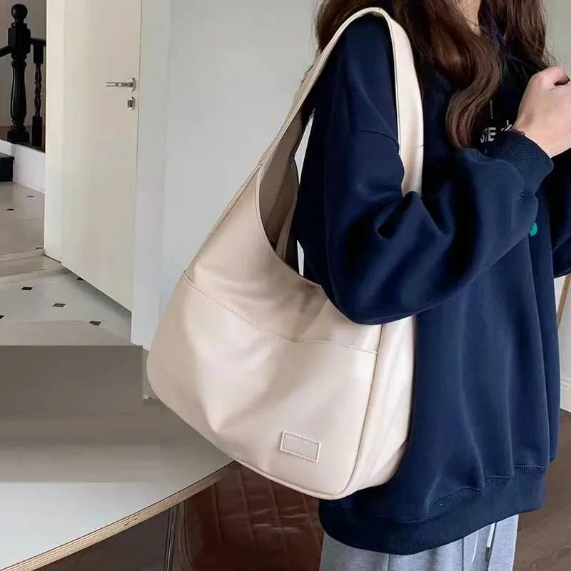 Large capacity tote bag, new black leather simple casual commuting women's bag, fashionable and versatile single shoulder bag Econic Blanks