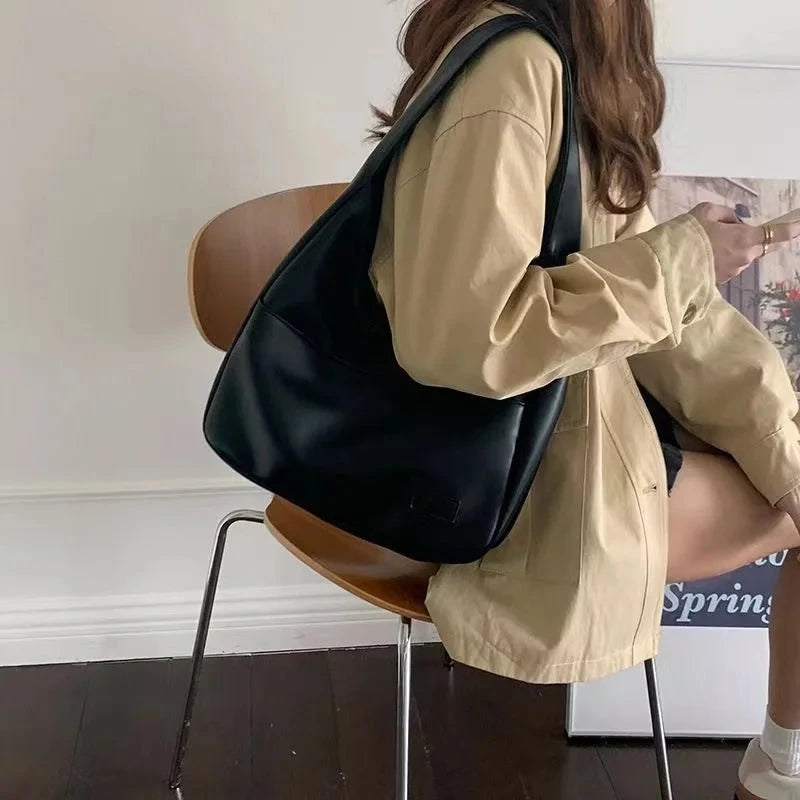 Large capacity tote bag, new black leather simple casual commuting women's bag, fashionable and versatile single shoulder bag Econic Blanks