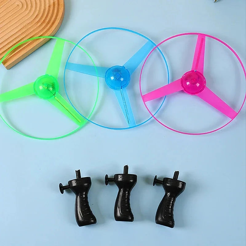 Pull Wire Glow UFO – Spinning LED Flyer Toy for Kids Outdoor Fun Econic Blanks