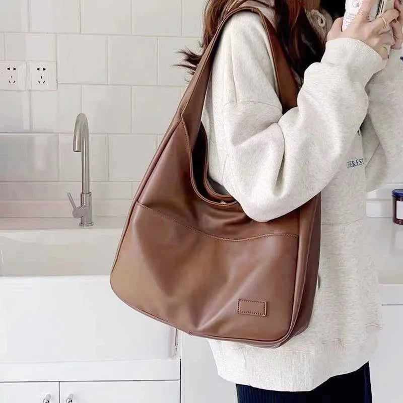 Large capacity tote bag, new black leather simple casual commuting women's bag, fashionable and versatile single shoulder bag Econic Blanks